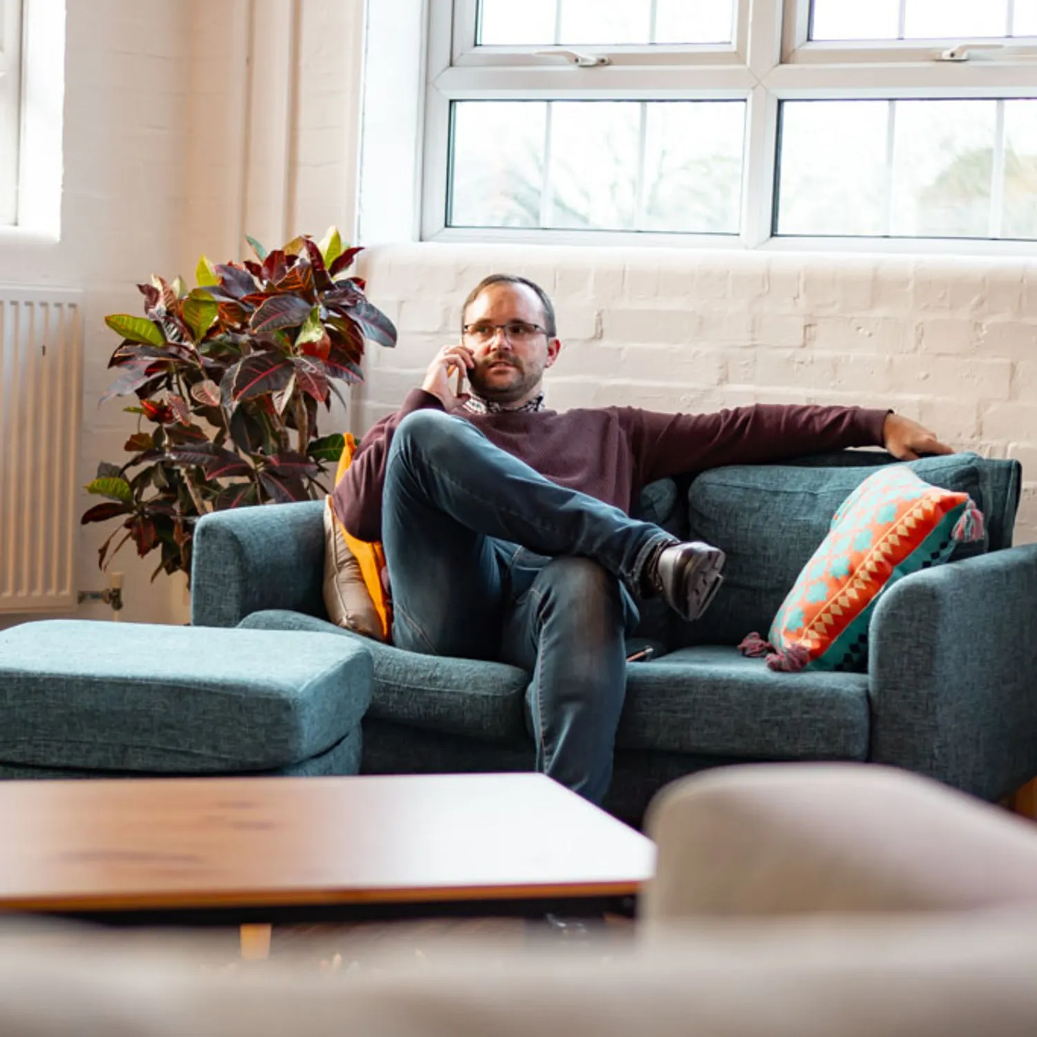 Rehabs UK Senior Treatment Advisor Scott Ardley on a phone call offering a free addiction assessment